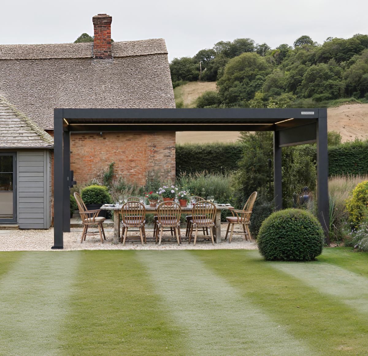 FlexPatio motorised pergola in a residential garden